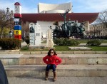 Young visitor posing in front of National Theater during Bucharest city tour, Dec&nbsp;2015