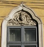 Window with stucco female head, Bucharest
