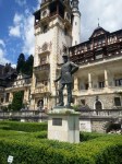 King Carol standing proud in front of his Peles&nbsp;Castle
