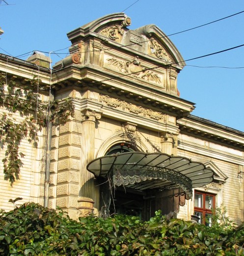 Entry door late 19th century house awning Bucharest